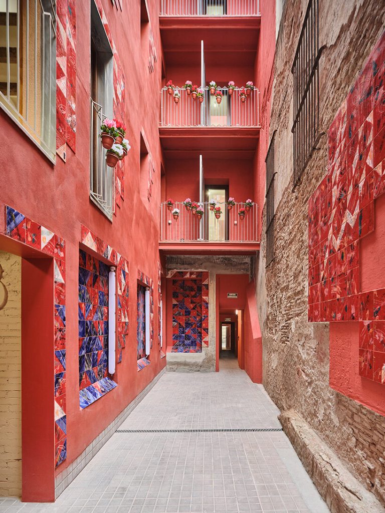 ceramic tiles tell stories of barcelona’s residents in restored social housing by MIAS architects