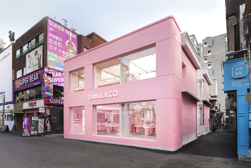 ultra pink k-beauty flagship store contrasts urban texture in seoul